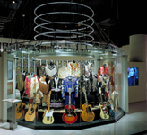 The collection of memorabilia gathered by the country music artist Marty Stuart dominates one entrance to “Treasures Untold: Unique Collections from Devoted Fans” at the Country Music Hall of Fame and Museum. An accompanying video of Stuart discussing his own experience as a collector helps to frame and validate the historical work undertaken by fans. Photograph by Timothy Hursley. Architects: Tuck-Hinton Architects.