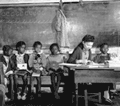 A segregated school in White Plains, Georgia, 1941. African American teachers and students grappled with inadequate facilities, forming bonds that benefited intellectual and community development.