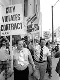 City councilmen David Eberhard (left) and Jack Kelley participate in the Detroit Police Officers Association protest against a court ruling that upheld affirmative action hiring outside the federal courthouse in downtown Detroit on May 9, 1975. 