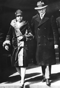 Looking the picture of prosperity, Aaron Sapiro, who was suing Henry Ford for libel, and his wife, Janet, descend the steps of the federal courthouse in Detroit in March 1927. The litigation nearly bankrupted the Sapiros. 