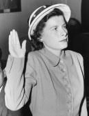 Senator Joseph McCarthy’s case against Annie Lee Moss rested on the testimony of Mary Stalcup Markward, shown here being sworn in on June 11, 1951, before the House Committee on Un-American Activities. Markward’s reputation as a star witness in a series of government investigations of Communism in the Washington, D.C., area was seriously harmed by her role in the Moss investigation. Photograph by Arthur Ellis.  Courtesy Washington Post.