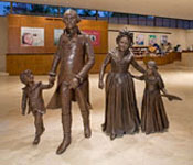Life-size bronze sculptures of George Washington, Martha Washington, and her two grandchildren, Nelly and Washy, welcome visitors to Mount Vernon’s Ford Orientation Center, and present George Washington as a private man, rather than a military hero. 