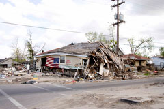 In this photograph taken in April 2006, a devastated home in New Orleans’s Lower Ninth Ward bears witness to Hurricane Katrina’s destructive force and human toll. 