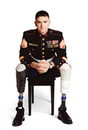 Thirty-year-old Marine Corps S.Sgt. John Jones, of San Antonio, Texas, lost both legs below the knee and suffered other injuries in Al Qaim, Iraq, on January 3, 2005. Jones is one of ten Iraq War veterans who recalls his “alive day” (the day he was wounded) in Alive Day Memories.